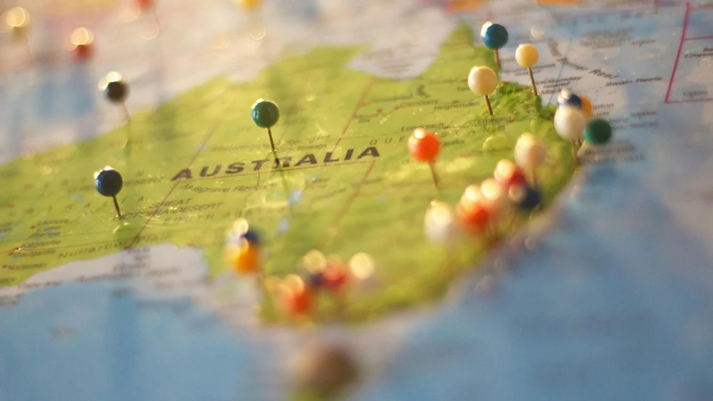 Map of Australia covered with multiple colored location pins marking different regions and cities
