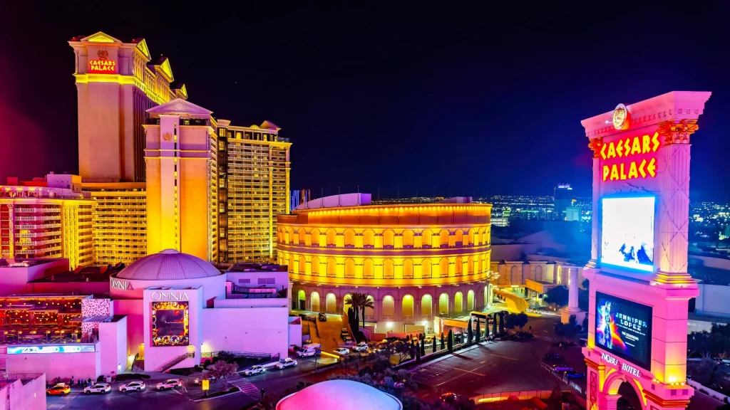 Caesars Palace hotel and casino illuminated at night in Las Vegas