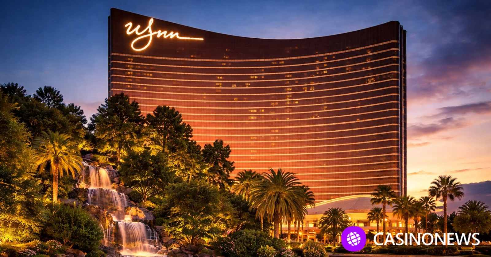 Exterior view of the Wynn Las Vegas hotel tower at dusk, representing the company facing lawsuits after a reported data breach.