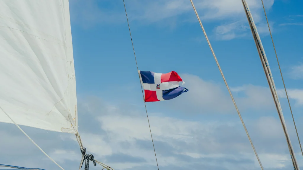 Dominican Republic flag on a sailing vessel representing Caribbean gaming and betting markets