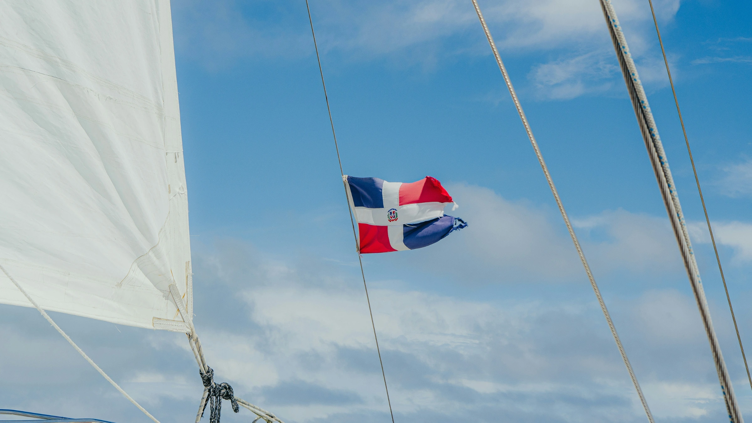 Dominican Republic flag on a sailing vessel representing Caribbean gaming and betting markets