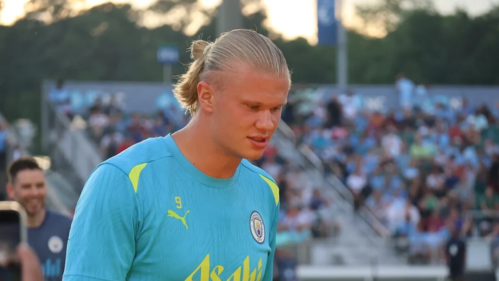 Erling Haaland wearing Manchester City training kit during a public football training session