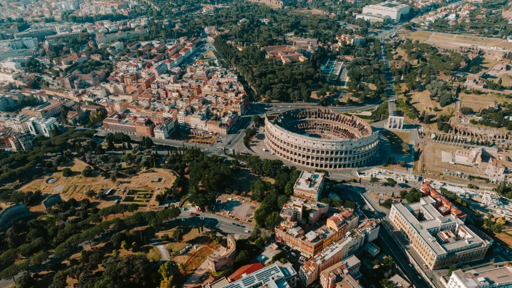 Aerial view of Rome with Colosseum, historic landmarks and dense urban landscape