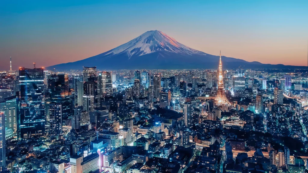 Tokyo skyline at dusk with Mount Fuji in the background, illustrating Japan’s crackdown on illegal online gambling.