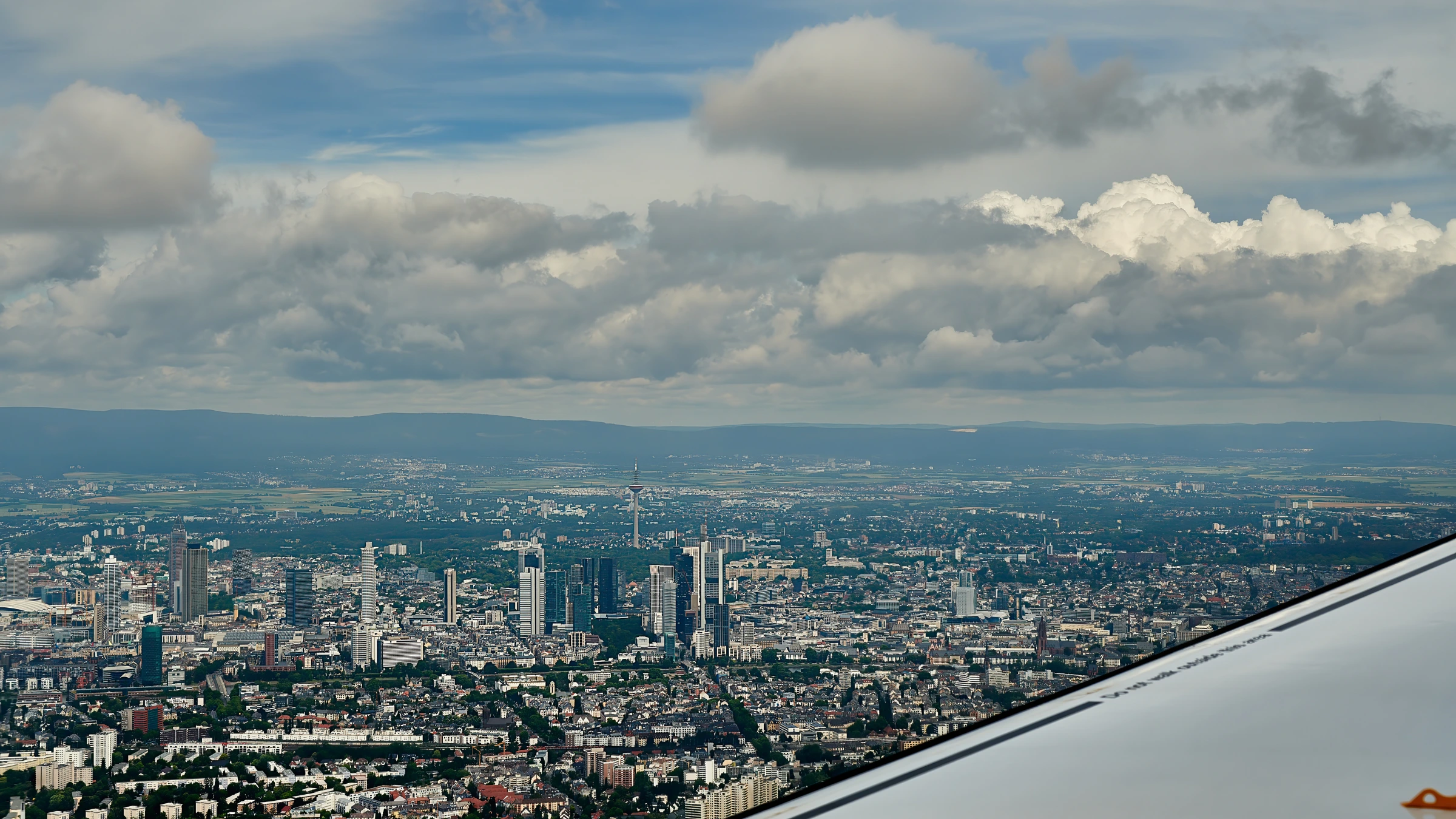 Aerial view of Frankfurt skyline seen from airplane above city landscape