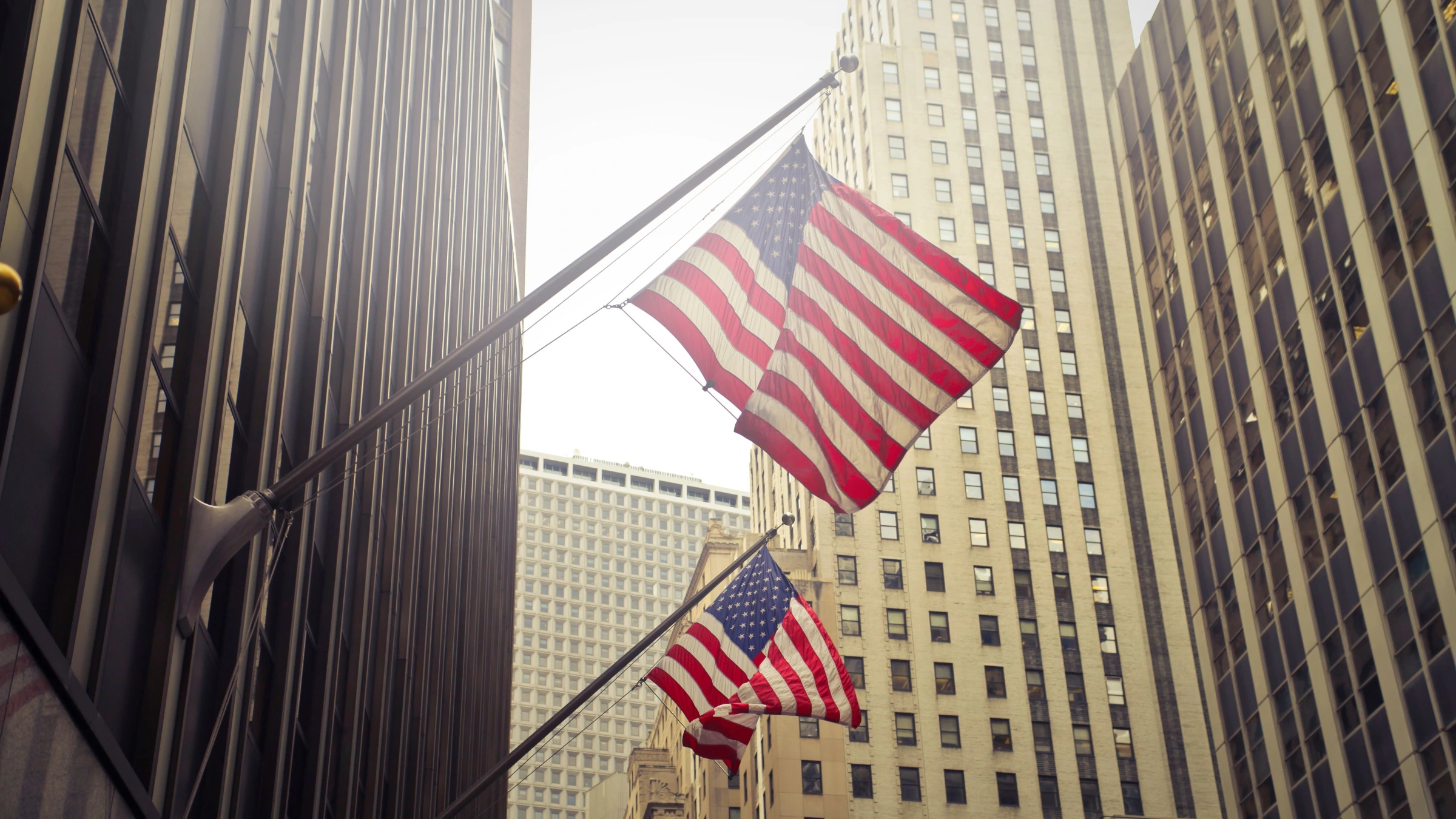 American flags reflecting regulatory and commercial developments across the United States gaming industry