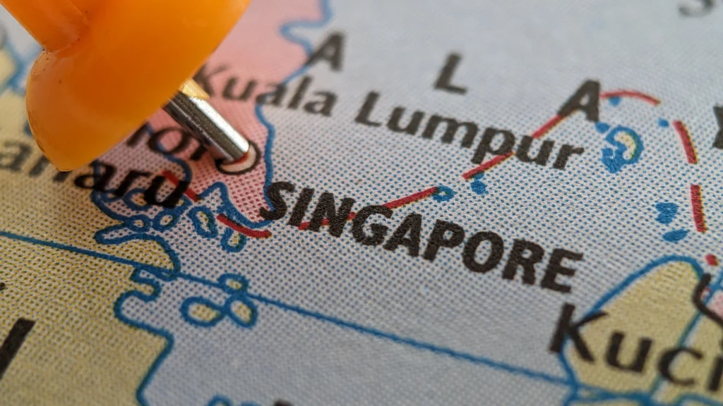 Close-up map showing Singapore location marked with orange pushpin in Southeast Asia