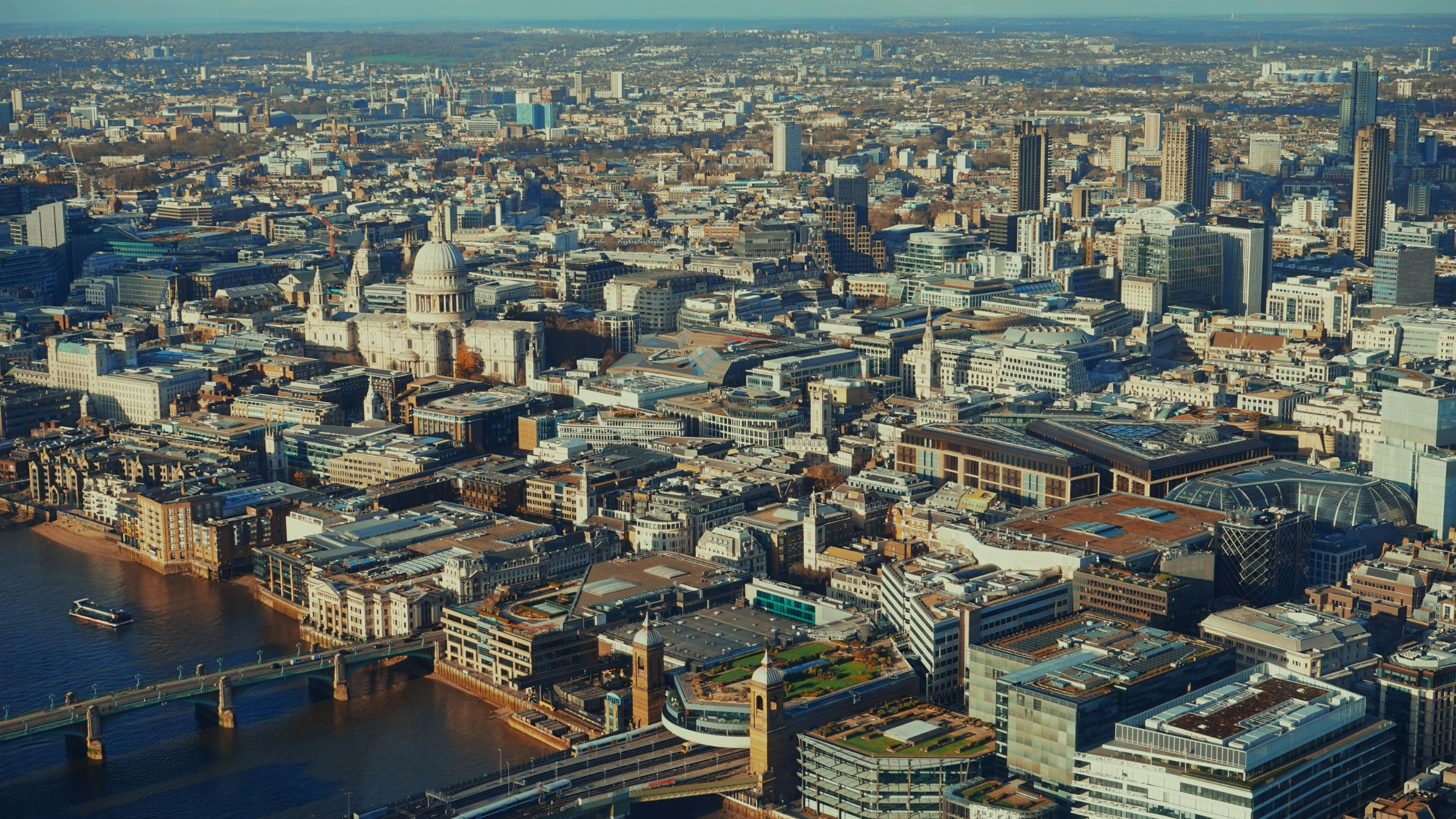 Aerial view of London skyline featuring St Paul’s Cathedral and central city buildings