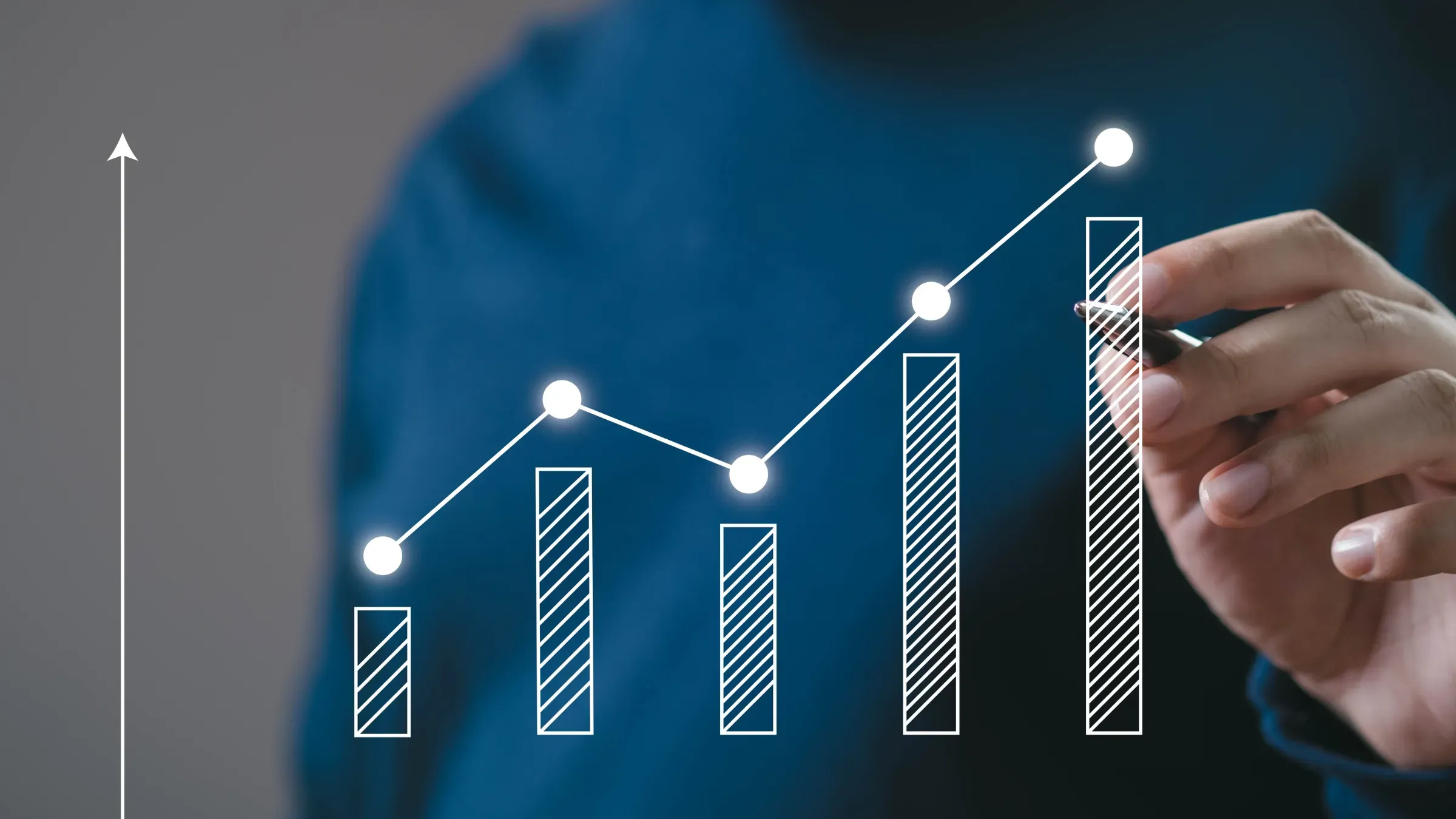 Hand drawing upward business growth chart with rising bars and trend line