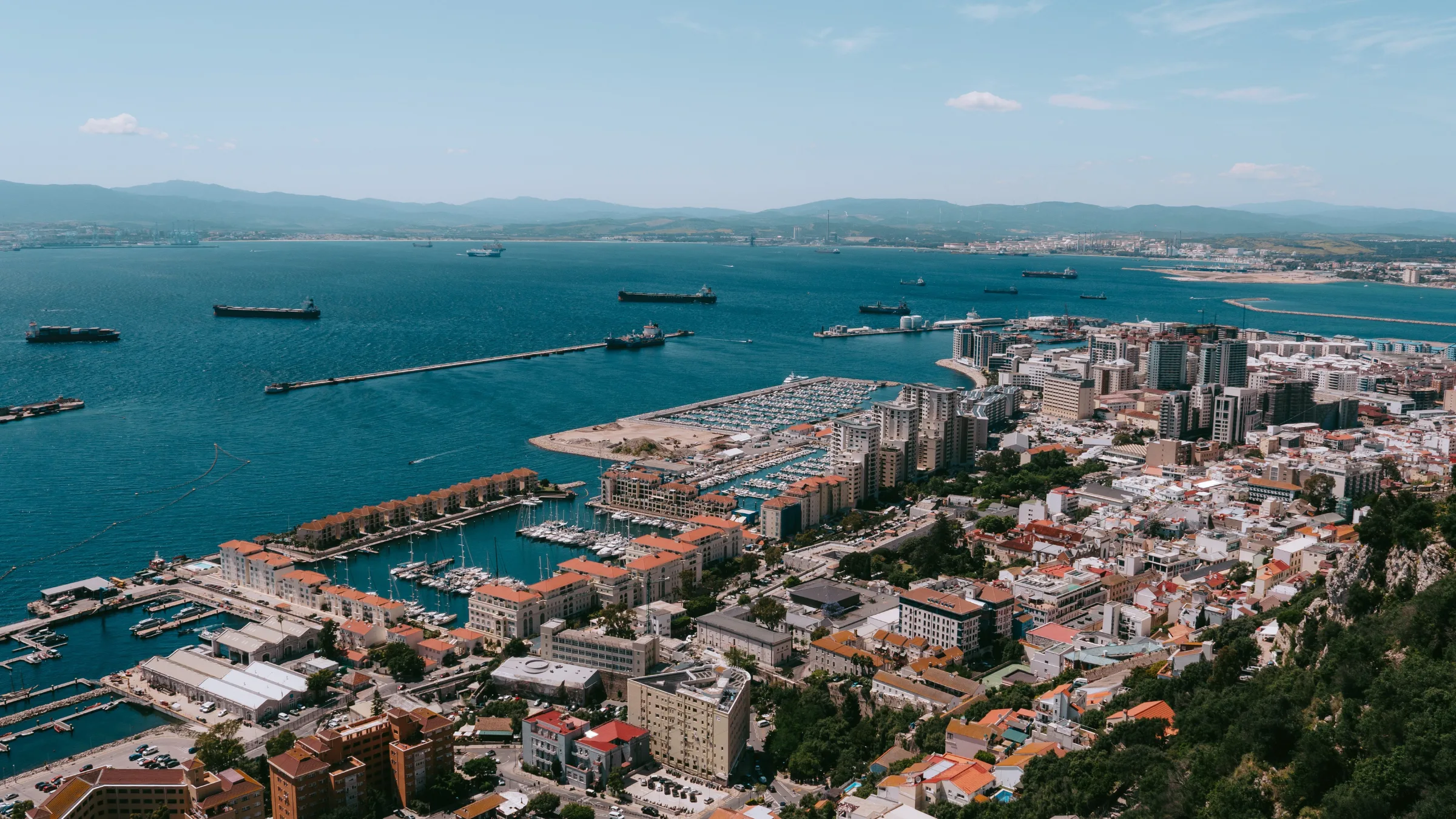 Gibraltar waterfront reflecting regulatory approval for prediction market business expansion